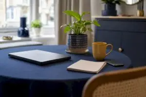 Neat home workspace with laptop and coffee cup