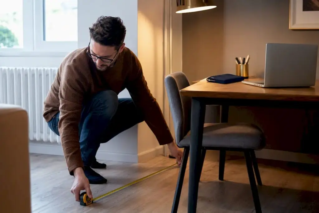 Sole trader measuring a UK home office