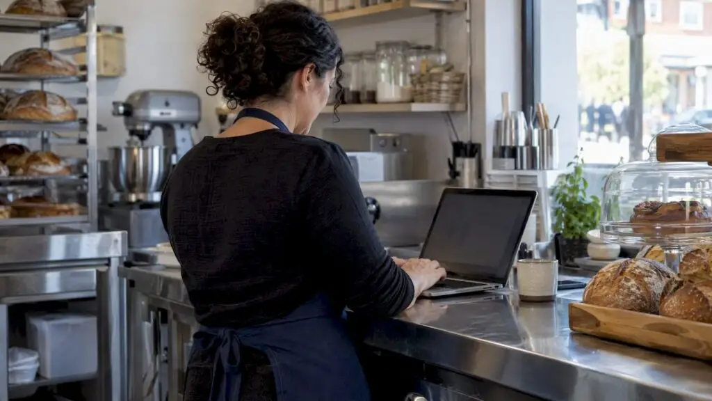 Bakery owner correcting a VAT bookkeeping entry